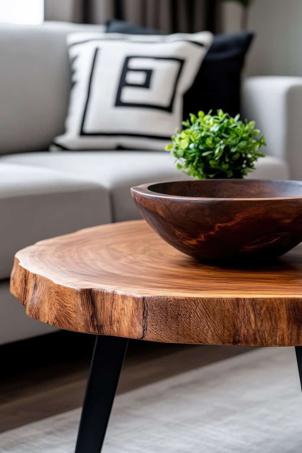 Mid Century Modern Coffee Table- Stylish wood coffee table with decorative bowl and plant in modern living room